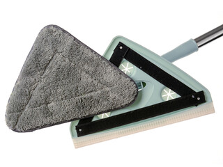 The mop is triangular with interchangeable nozzles.