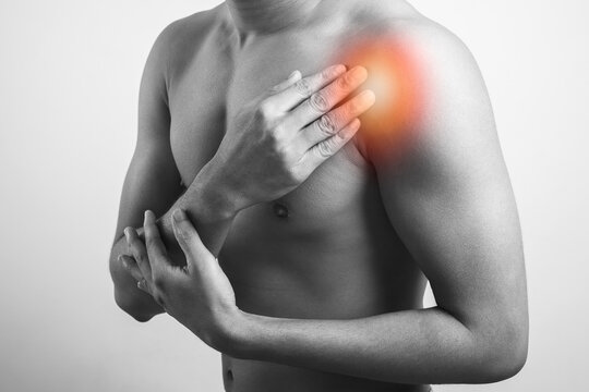 closeup view of man showing his front shoulder pain
