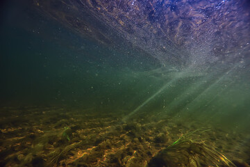 sun rays under water landscape, seascape fresh water river diving