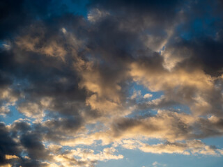 Naklejka na ściany i meble Dramatic sky at sunset. Beautiful sky