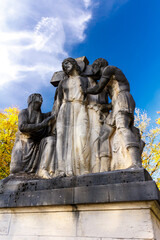Stone statue of Jesus carrying the Cross