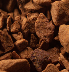Instant coffee granules as background.