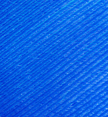 Blue feather as a background.