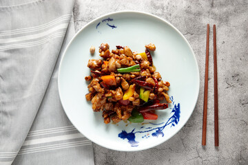 Kung pao chicken dish on table
