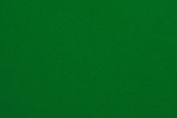Dark green background with paper fabric canvas texture for layout, collage, coaster. Pure color.