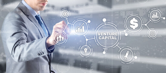 Venture capital. Investor capital. Businessman pressing virtual screen inscription