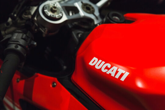  Ducati brand name label is on a red sports bike