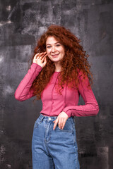 Obraz premium Portrait of a young beautiful red hair girl