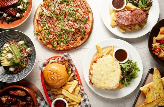 Top down shot of various restaurant dishes