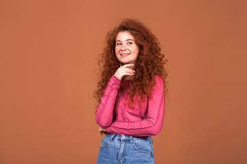 Portrait of a young beautiful red hair girl