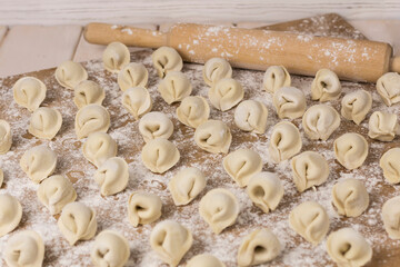 traditional russian pelmeni ravioli on table