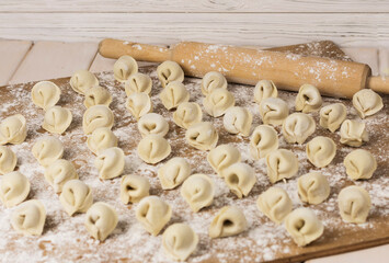 traditional russian pelmeni ravioli on table