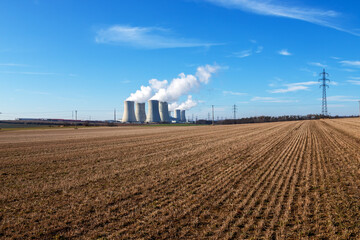 Dukovany Nuclear Power Plant in the Czech Republic, Europe. Smoke cooling towers. There are clouds...