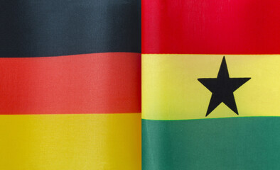 fragments of the national flags of Germany and the Republic of Ghana in close-up