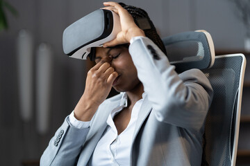 African american business woman suffer from eyes strain feel dizziness or headache after using...