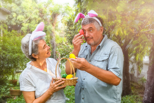 Portrait of a senior couple with Easter eggs
