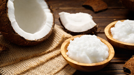 Organic coconut butter in a wooden bowl.