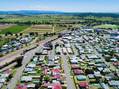 Houses and train station on the edge of country town in NSW Australia