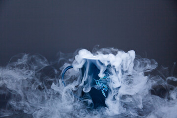 Dry ice vapour made of carbon dioxide spilling out into air