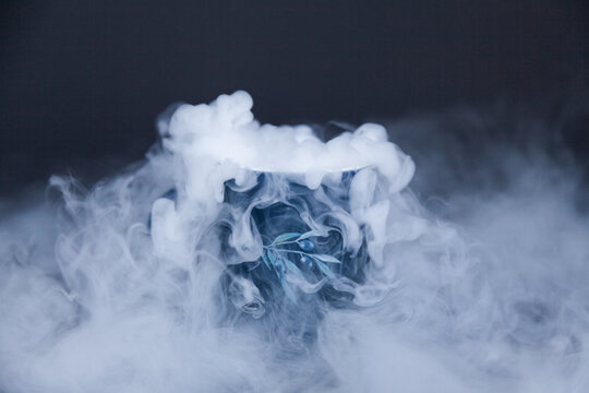 Dry ice vapour made of carbon dioxide spilling out into air