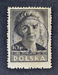 Cancelled postage stamp printed by Poland, that shows portrait of Marie Sklodowska Curie (1867-1934), circa 1947.