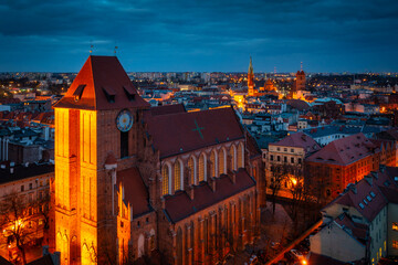 Architecture of the old town in Torun at dusk, Poland.