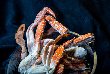 seafood crab asian street food in a plate on the background, fresh, delicious, natural © chalermphon
