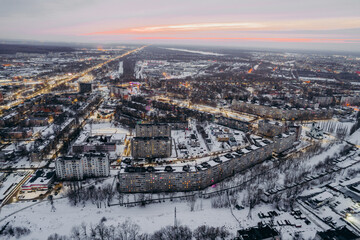 evening city, city lights shooting from a quadcopter,sunset