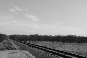 retro rural old railroad train tracks rails abandoned unused disused rundown black and white industrial tracks