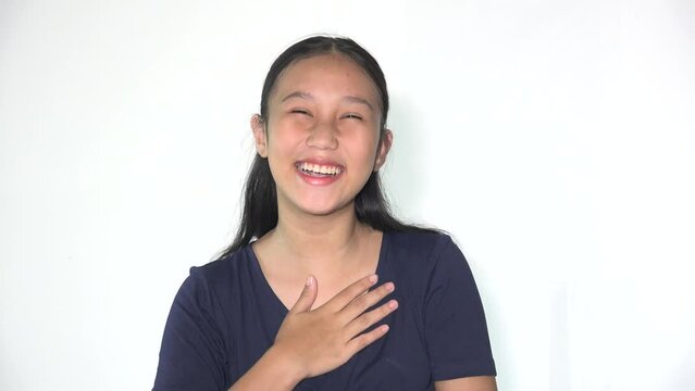 A Teen Asian Girl Laughing