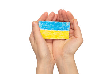Ukrainian flag in woman hands isolated on a white background.