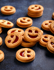 Tasty Biscuit face cookies with jam. Sweet pastries food