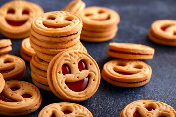 Tasty Biscuit face cookies with jam. Sweet pastries food