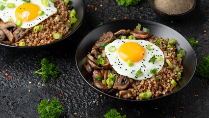 Bowl of Buckwheat with mushrooms, onion and egg. Healthy food