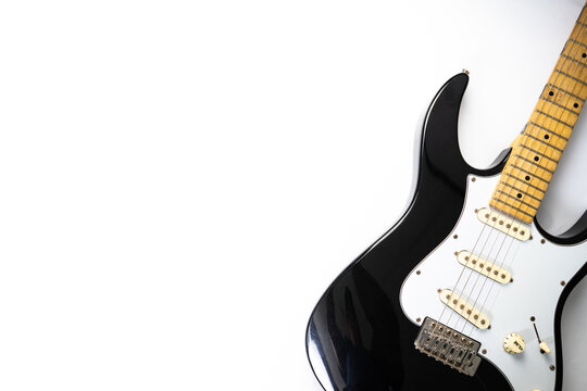 Electric guitar body close up  in white background, overhead with copy space, musical banner picture.