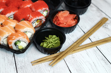 Fresh sushi on a wooden table.