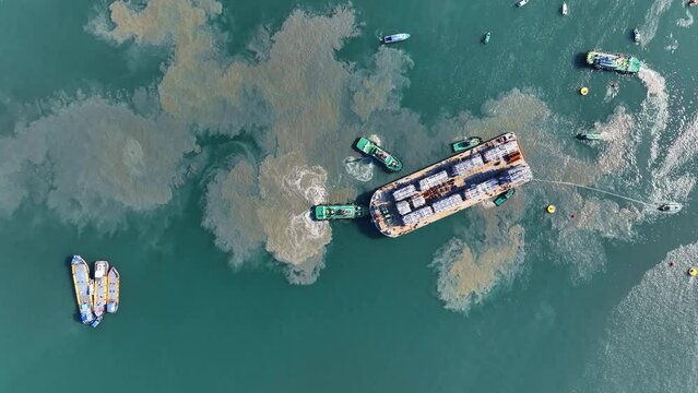 Tug Boat drag Barge ship carry Metal steel pipe construction unit , No International Sewage sludge Pollution Prevention Certificate, Sewage Sludge in the sea made by Activity of ship concept 