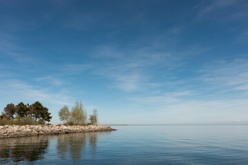 Fototapeta premium view of the lake with jetty and trees