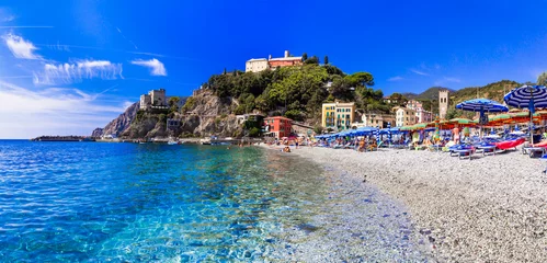  Italian summer holidays - Monterosso al Mare . view of beach and castle above, national park Cinque terre, Liguria, Italy © Freesurf