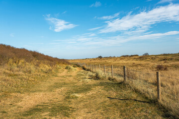 Rural footpath in Hunstanton, North Norfolk. Captured on a bright and sunny day in the winter.