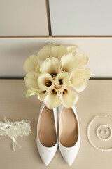 Elegant wedding accessories of the bride in the morning on the day of the celebration.