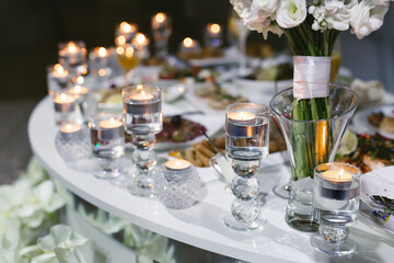 Served wedding banquet table with dishes in the restaurant