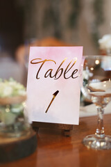 Guest table number. Wedding table in the restaurant.