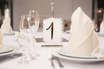 Guest table number. Wedding table in the restaurant.