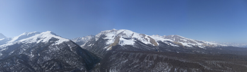 Fototapeta na wymiar Panorama Caucasian mountains winter landscape 