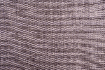 Close up on texture of black soft woven fabric to show the detail and pattern of material. Background and texture concept.