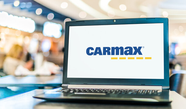 Laptop computer displaying logo of CarMax