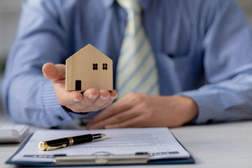 On the one hand, he is the salesman in charge of the project, he is preparing the contract...