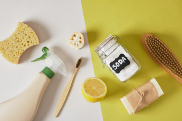 eco friendly lifestyle concept, non-toxic cleaning products beige and green background, soap, spray...