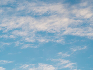 An image of a blue sky with clouds.
